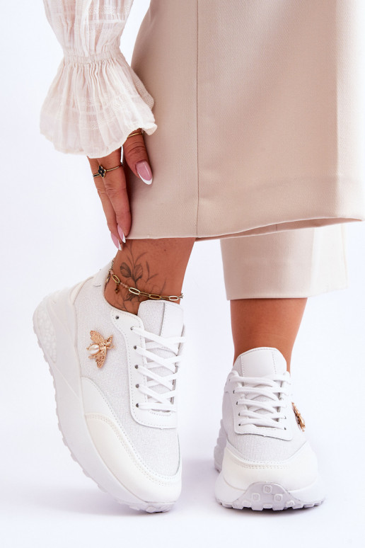 Läikivad jalatsid sportlikud jalatsid kaunistustega valget värvi Seneca