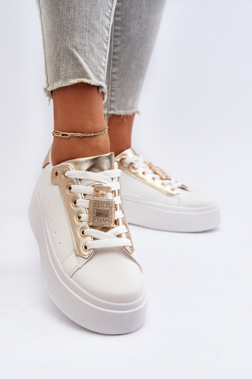Sneakers tüüpi jalanõud   kaunistustega valget värvi Celedria