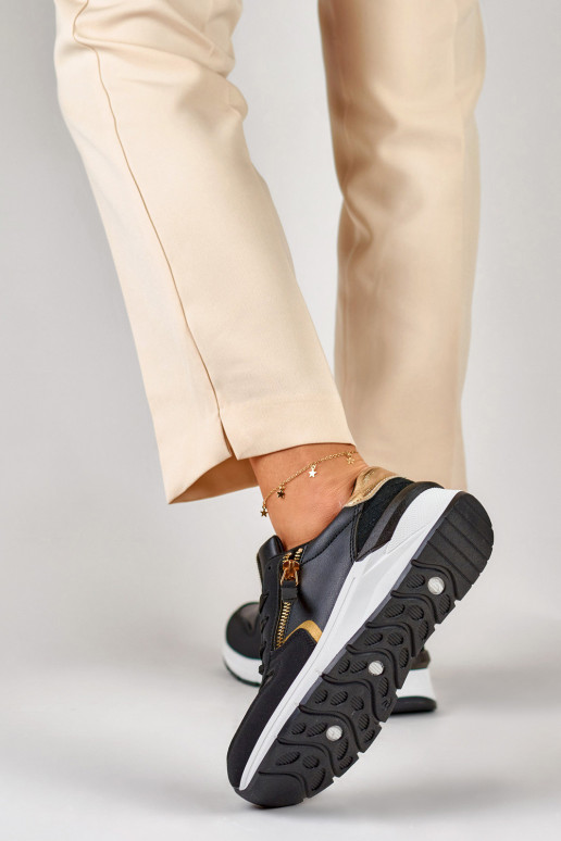 Mustad kuldse tõmblukuga naiste jalatsid