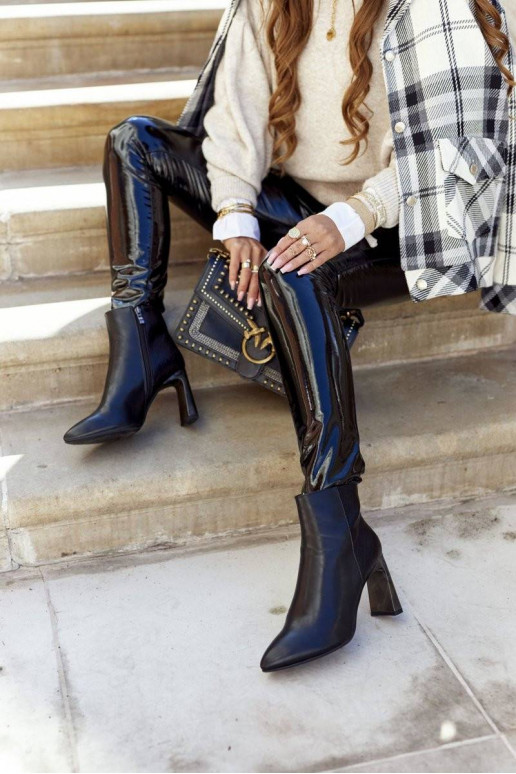 Naiste poolsaapad mustad kõrge jämeda...