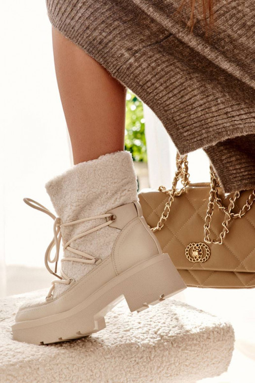 Naiste poolsaapad nööpidega...