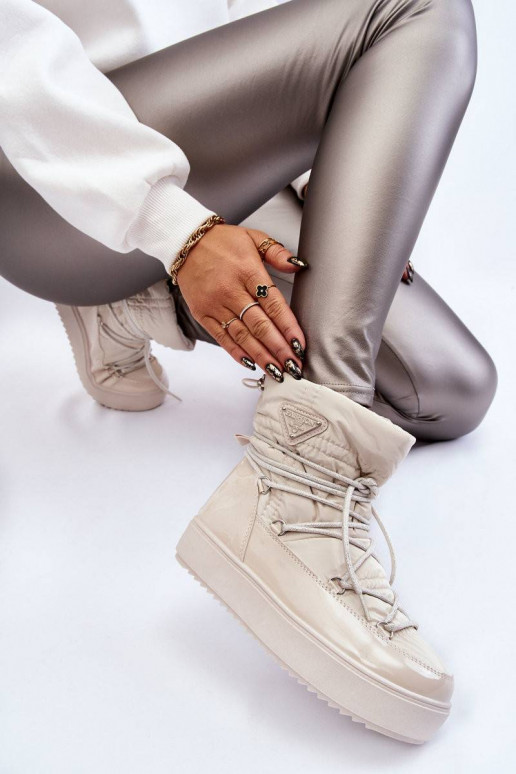 Moekad nööpidega lumesaapad...