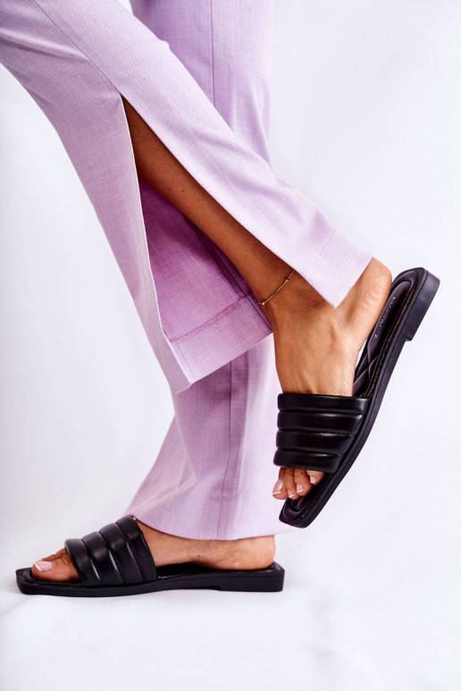 Plätud naturaalsest nahast mustad Raula