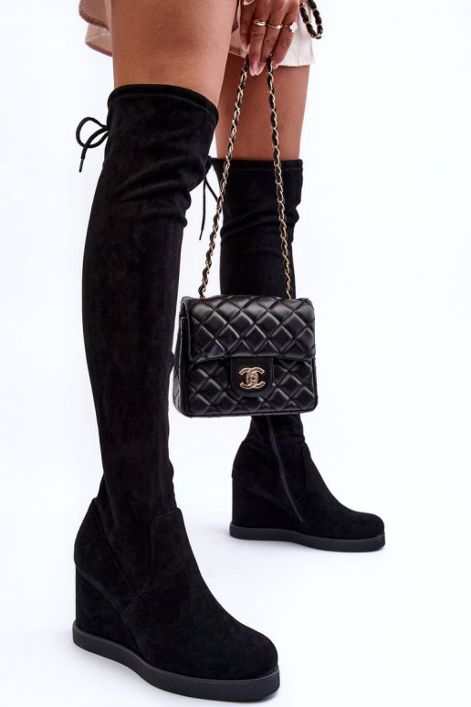 seemisnakhsed pika säärega saapad...