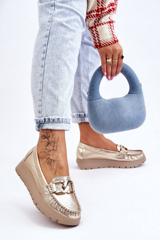 Mokassiinid platvormiga kaunistustega...