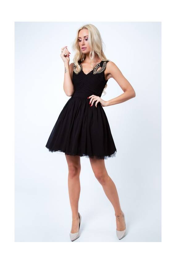 Party dress with opewnwork sleeves and neckline