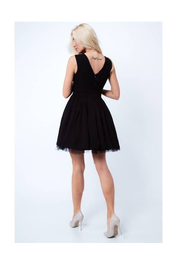 Party dress with opewnwork sleeves and neckline