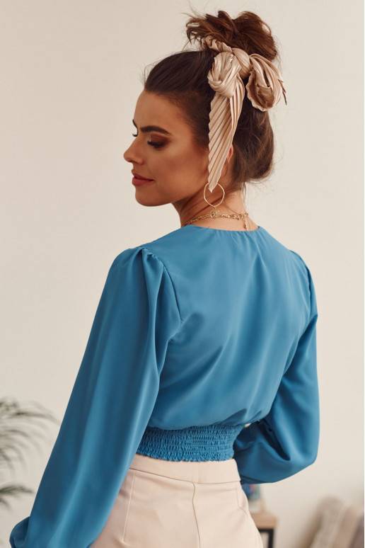 Lühike pikkade varrukatega pluus