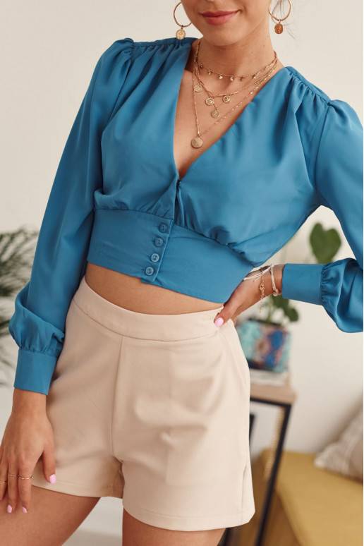 Lühike pikkade varrukatega pluus