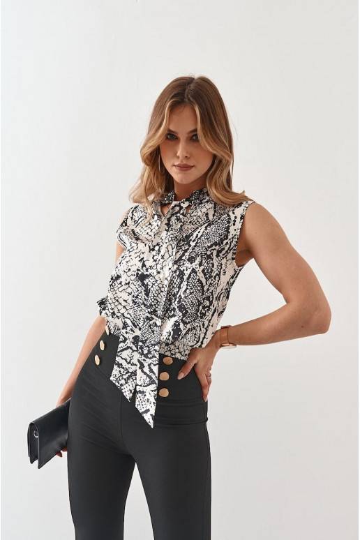 Loomade karusnahamustritega kreemjas ja must Loomade karusnahamustritega kreemjas ja must