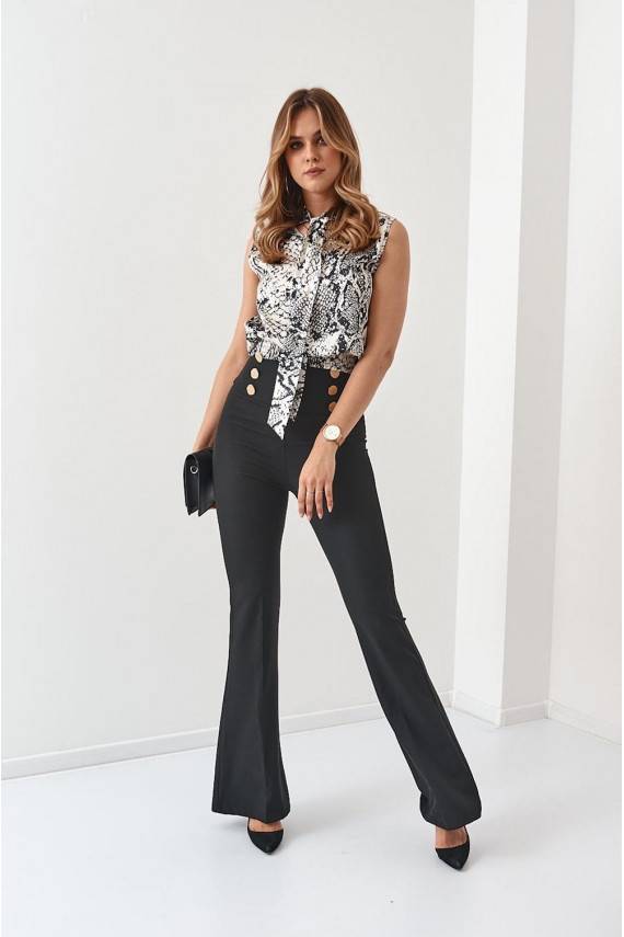 Loomade karusnahamustritega kreemjas ja must