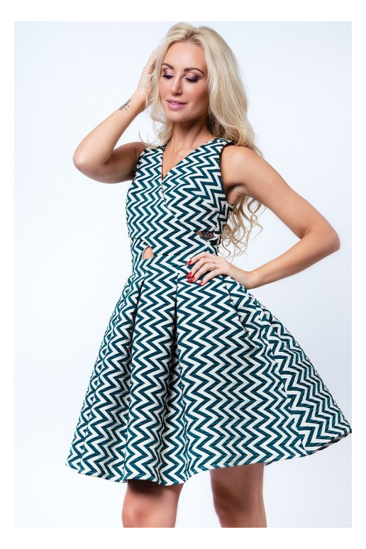 Party dress with opewnwork sleeves and neckline