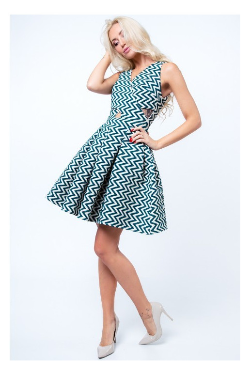 Party dress with opewnwork sleeves and neckline