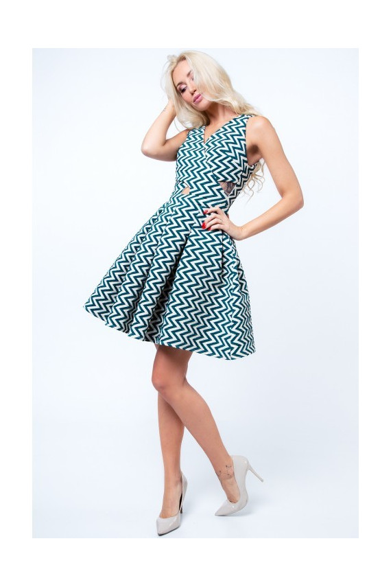 Party dress with opewnwork sleeves and neckline