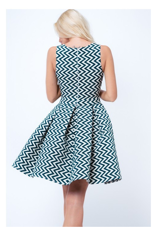 Party dress with opewnwork sleeves and neckline