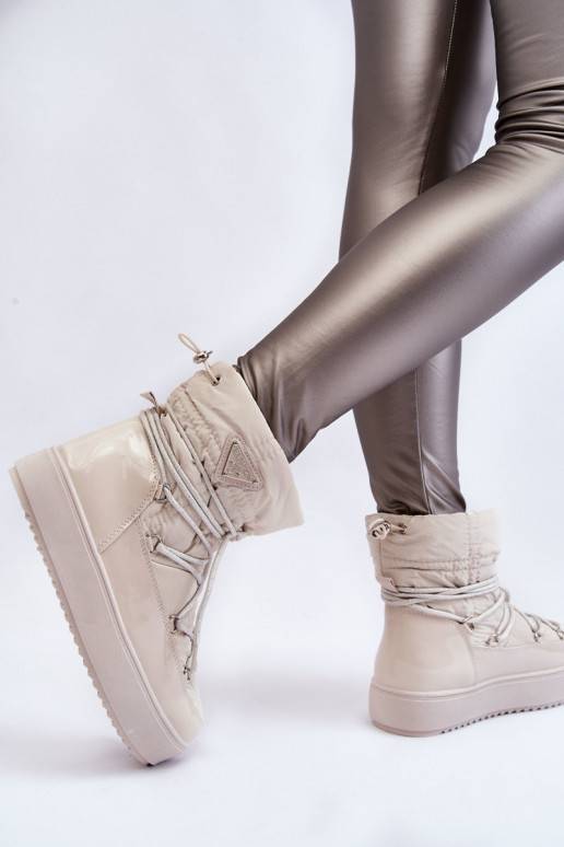   Moekad nööpidega lumesaapad nööritavad Elevandiluu värvi Carrios